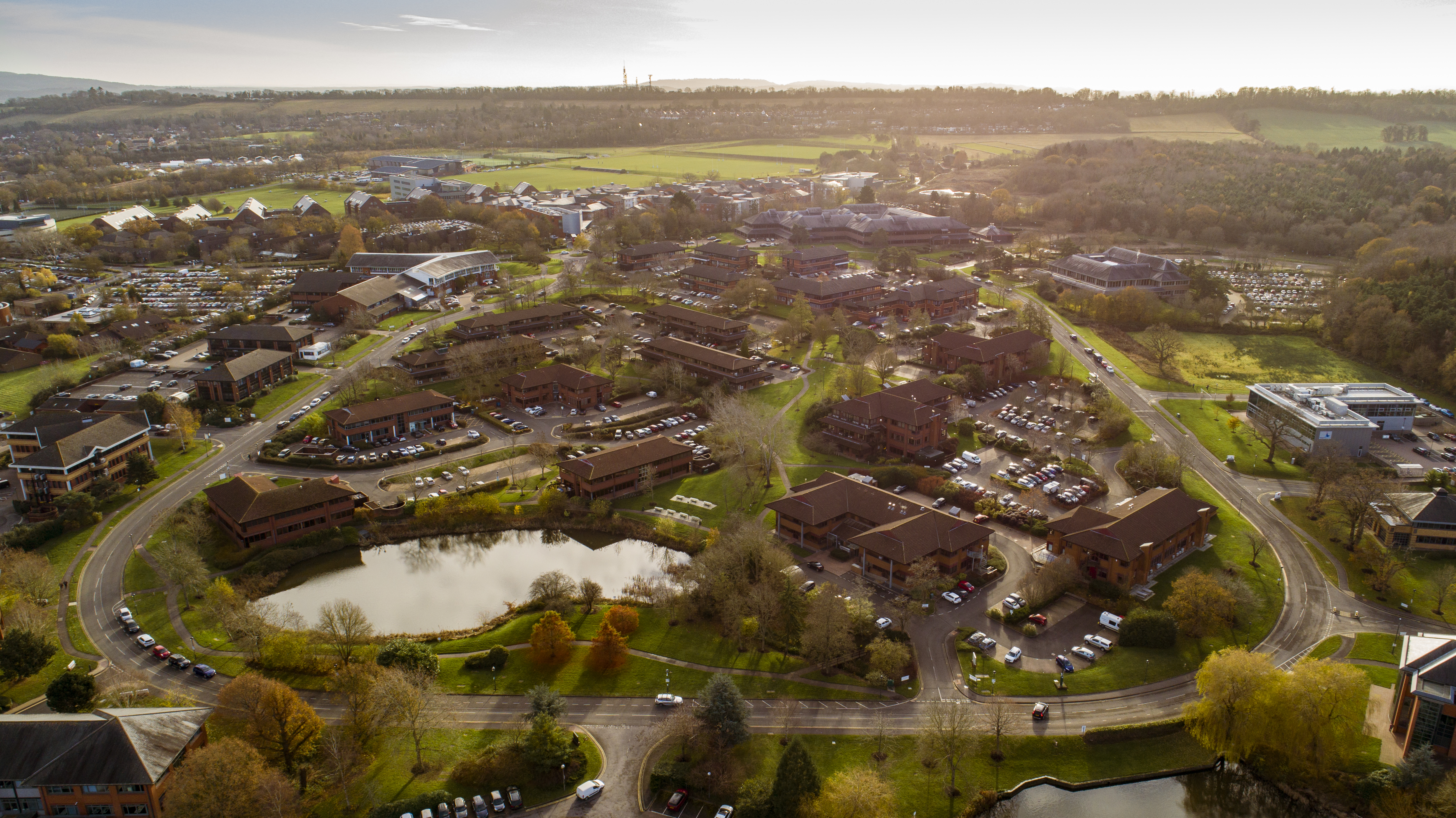 Overview of Surrey Research Park in the late evening sun